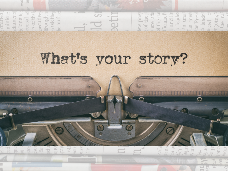 Sheet of paper in a typewriter with the text "What's your story?"