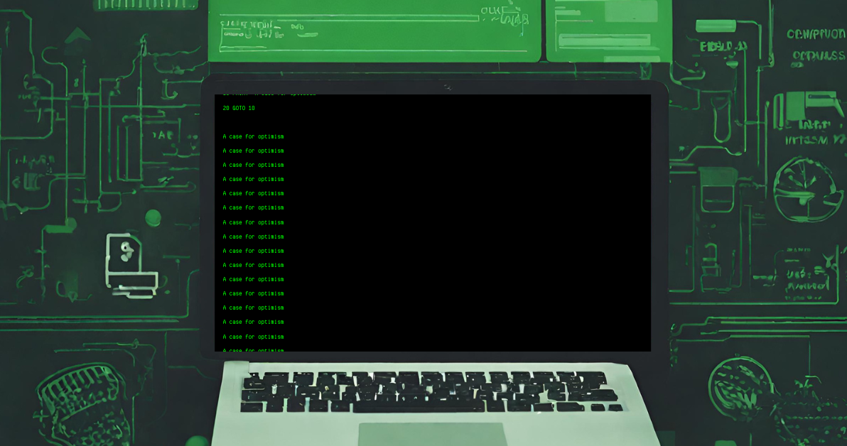 Laptop displaying a classic computer emulator screen in green on black.